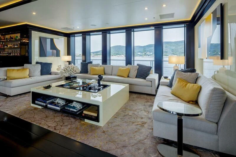 a living room with a large window aboard LADY VERA Yacht for Sale