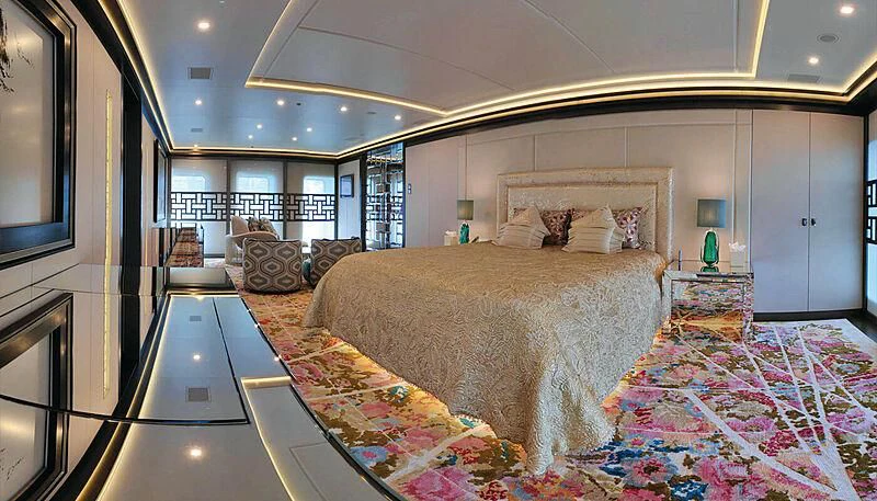 a large bedroom with a large bed aboard LADY VERA Yacht for Sale