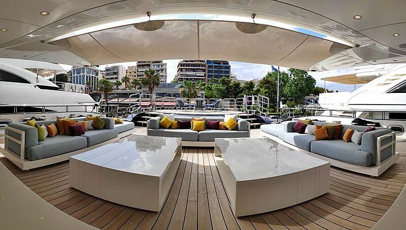 a living room with a large patio aboard LADY VERA Yacht for Sale