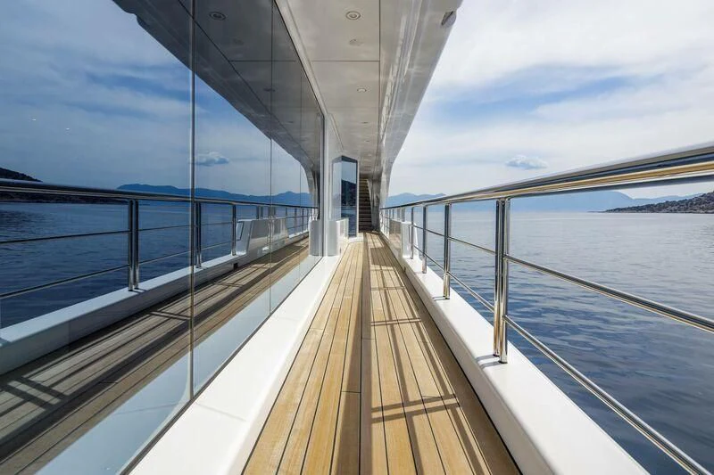 a long wooden walkway on a boat aboard LADY VERA Yacht for Sale