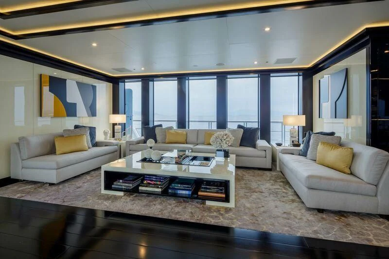 a living room with a large window aboard LADY VERA Yacht for Sale