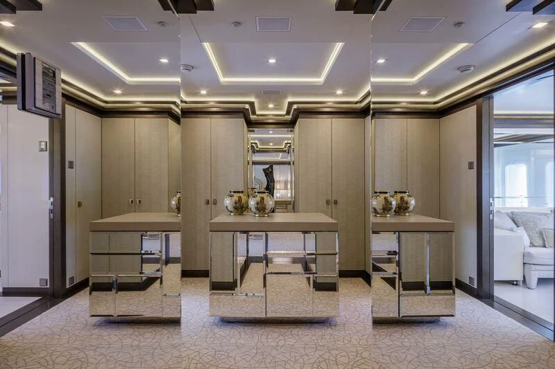 a large kitchen with a table aboard LADY VERA Yacht for Sale