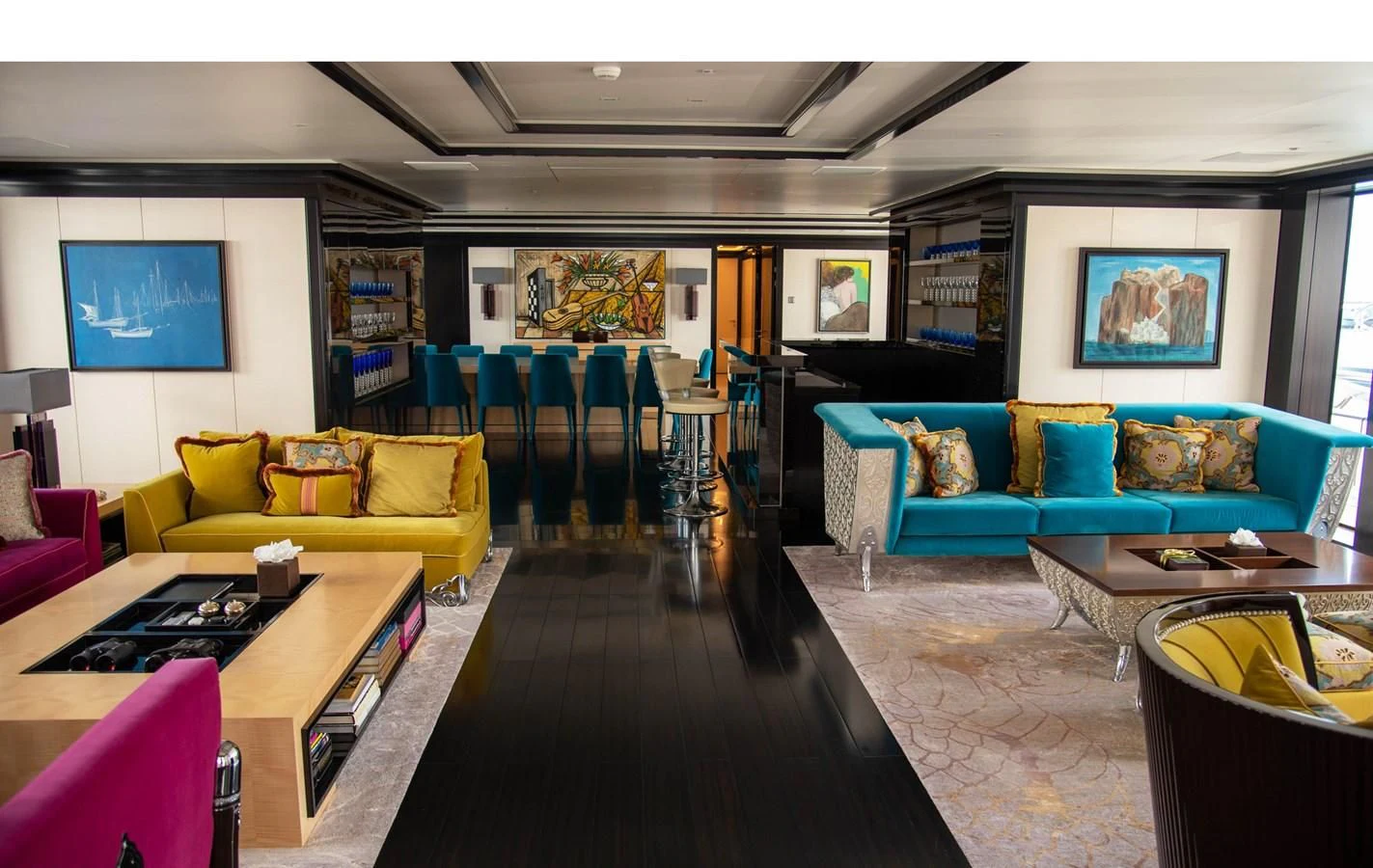 a living room with a table and chairs aboard LADY VERA Yacht for Sale