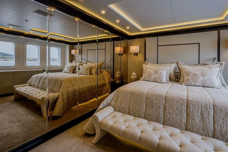 a couple of beds in a hotel room aboard LADY VERA Yacht for Sale