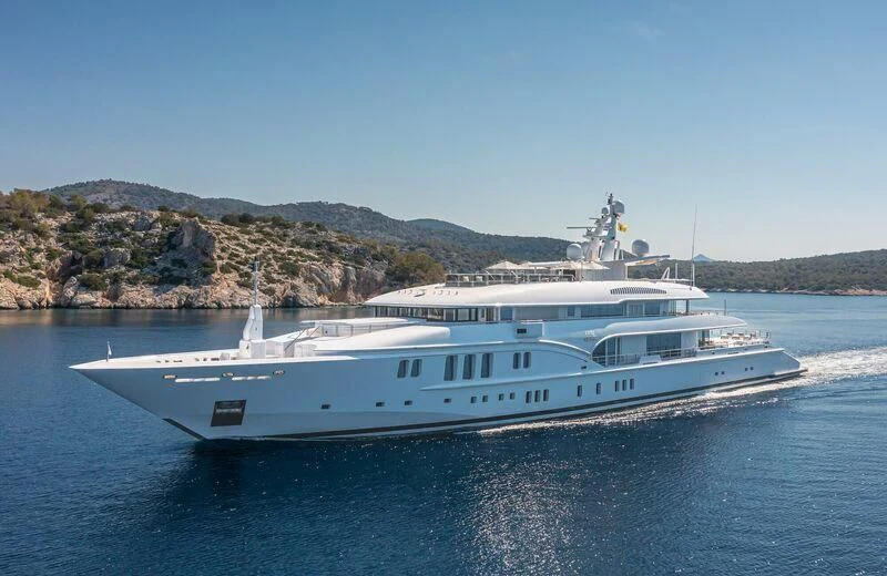 a large white yacht on the water aboard LADY VERA Yacht for Sale