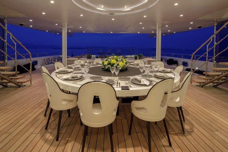a table set for a dinner party aboard LADY VERA Yacht for Sale