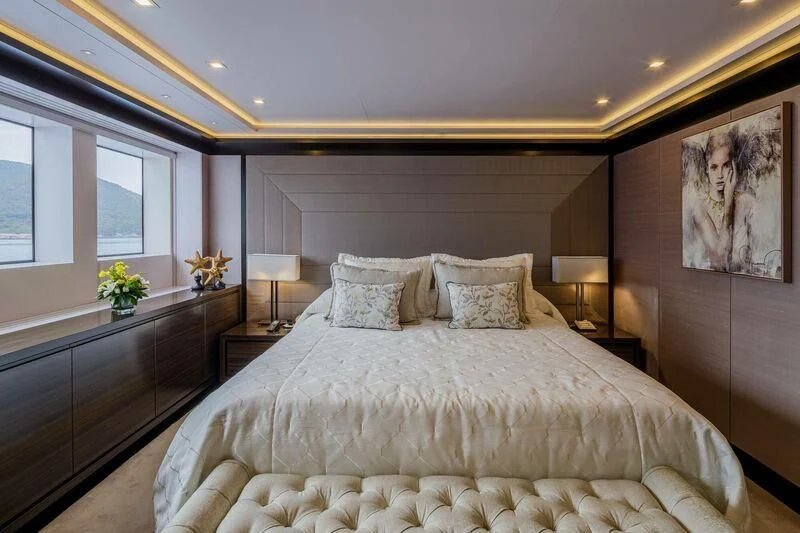a large bed in a hotel room aboard LADY VERA Yacht for Sale