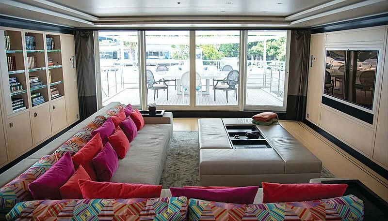 a living room with a large window aboard LADY VERA Yacht for Sale