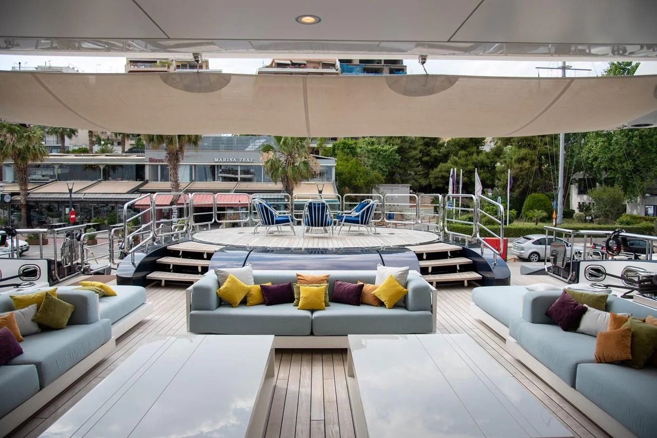 a patio with a couch and a pool aboard LADY VERA Yacht for Sale