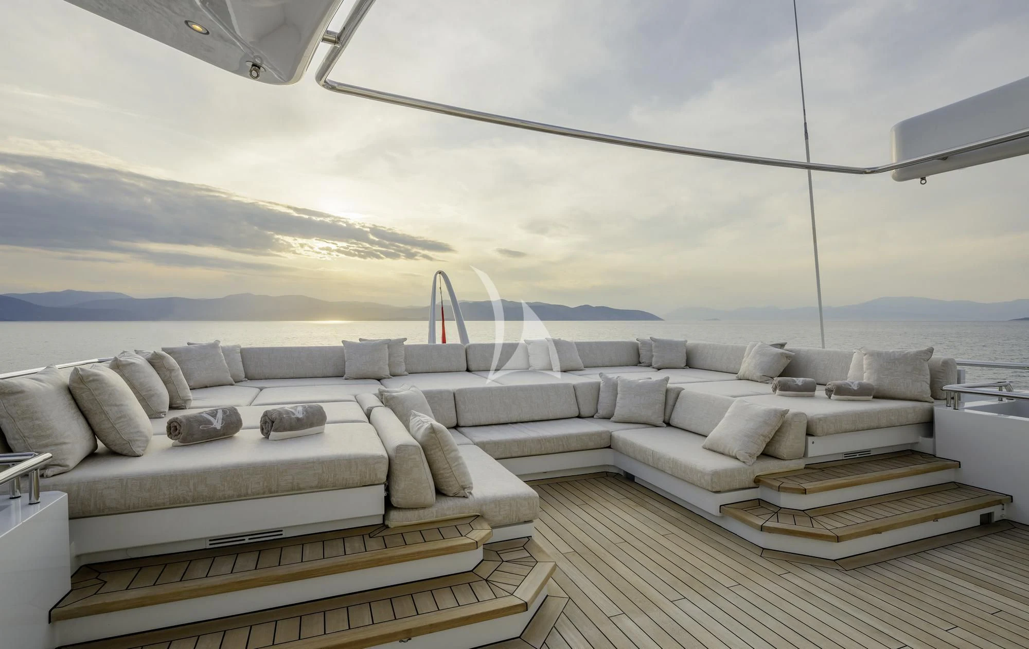a room with a couch and a large window aboard LADY VERA Yacht for Sale