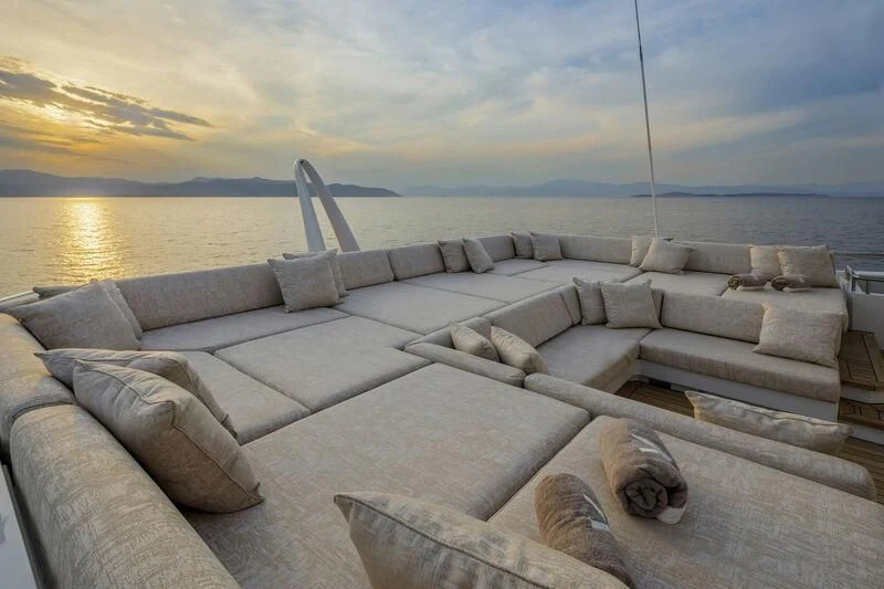 a large stone wall overlooking a body of water aboard LADY VERA Yacht for Sale