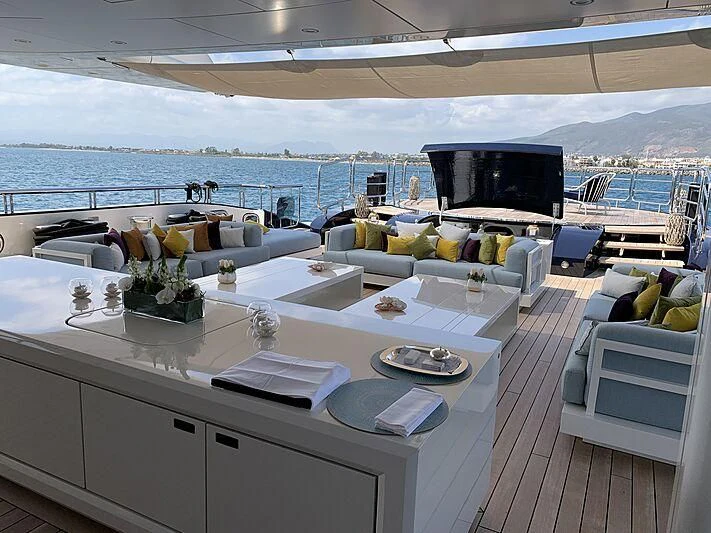 a kitchen with a view of the ocean aboard LADY VERA Yacht for Sale