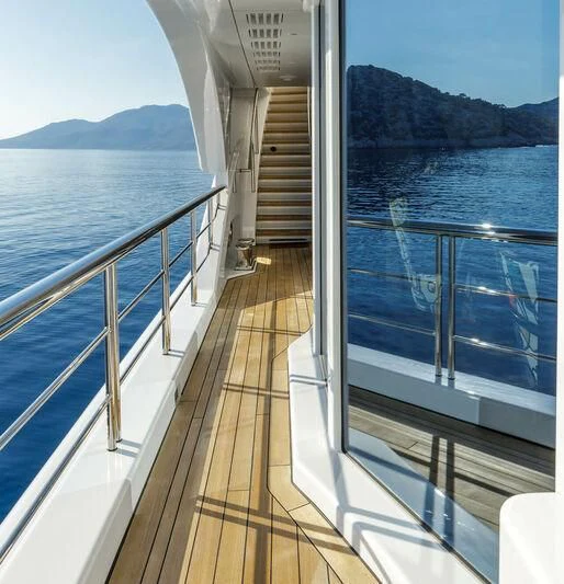 a balcony overlooking a body of water aboard LADY VERA Yacht for Sale