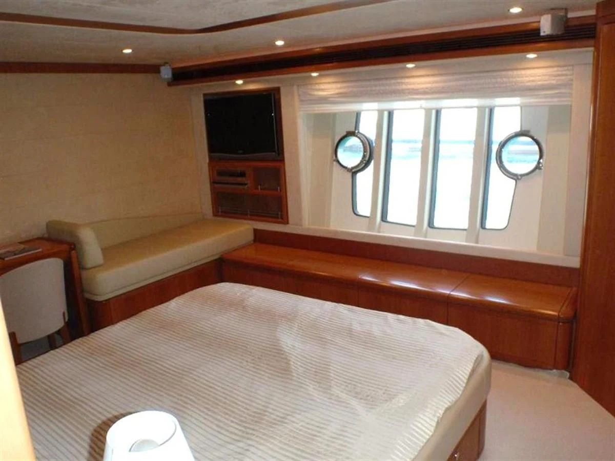 a room with a bed and a couch aboard 83' FERRETTI 830 Yacht for Sale