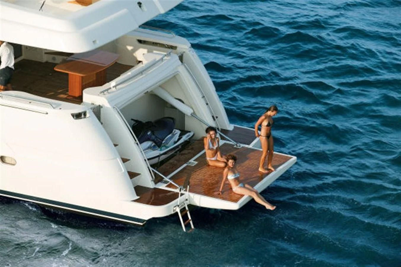 a group of people on a boat aboard 83' FERRETTI 830 Yacht for Sale