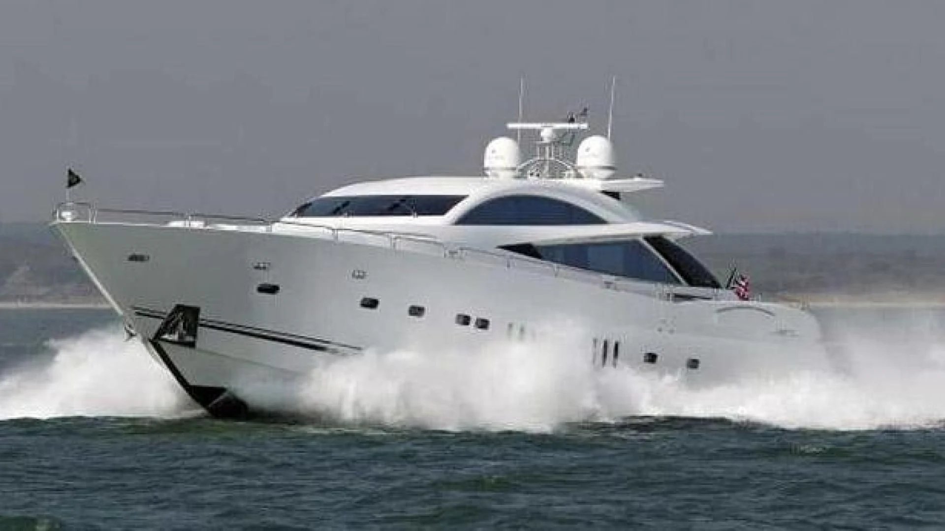 a white yacht in the water aboard DIABLO BLANCO Yacht for Sale