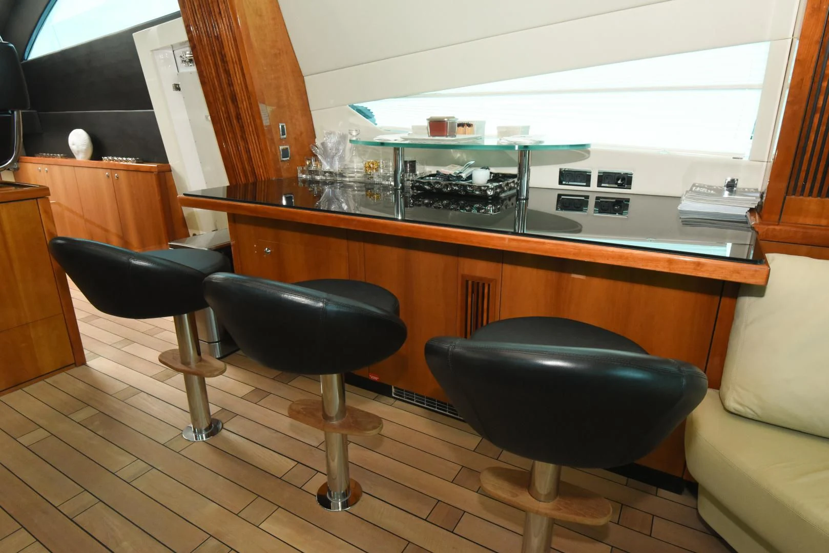 a room with a desk and chairs aboard DIABLO BLANCO Yacht for Sale