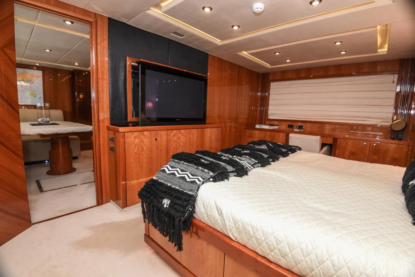 a room with a bed and tv aboard DIABLO BLANCO Yacht for Sale