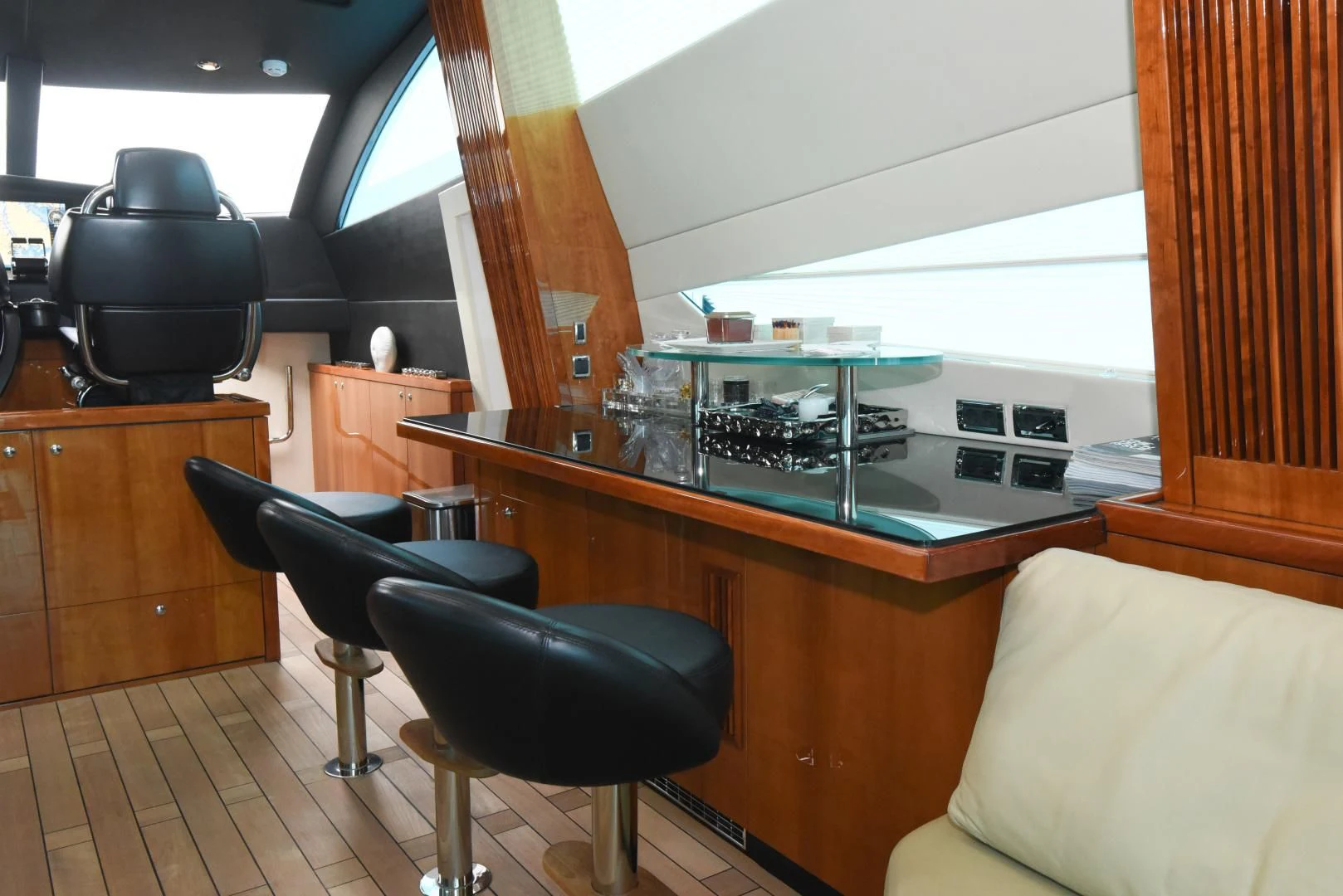 a room with a table and chairs aboard DIABLO BLANCO Yacht for Sale