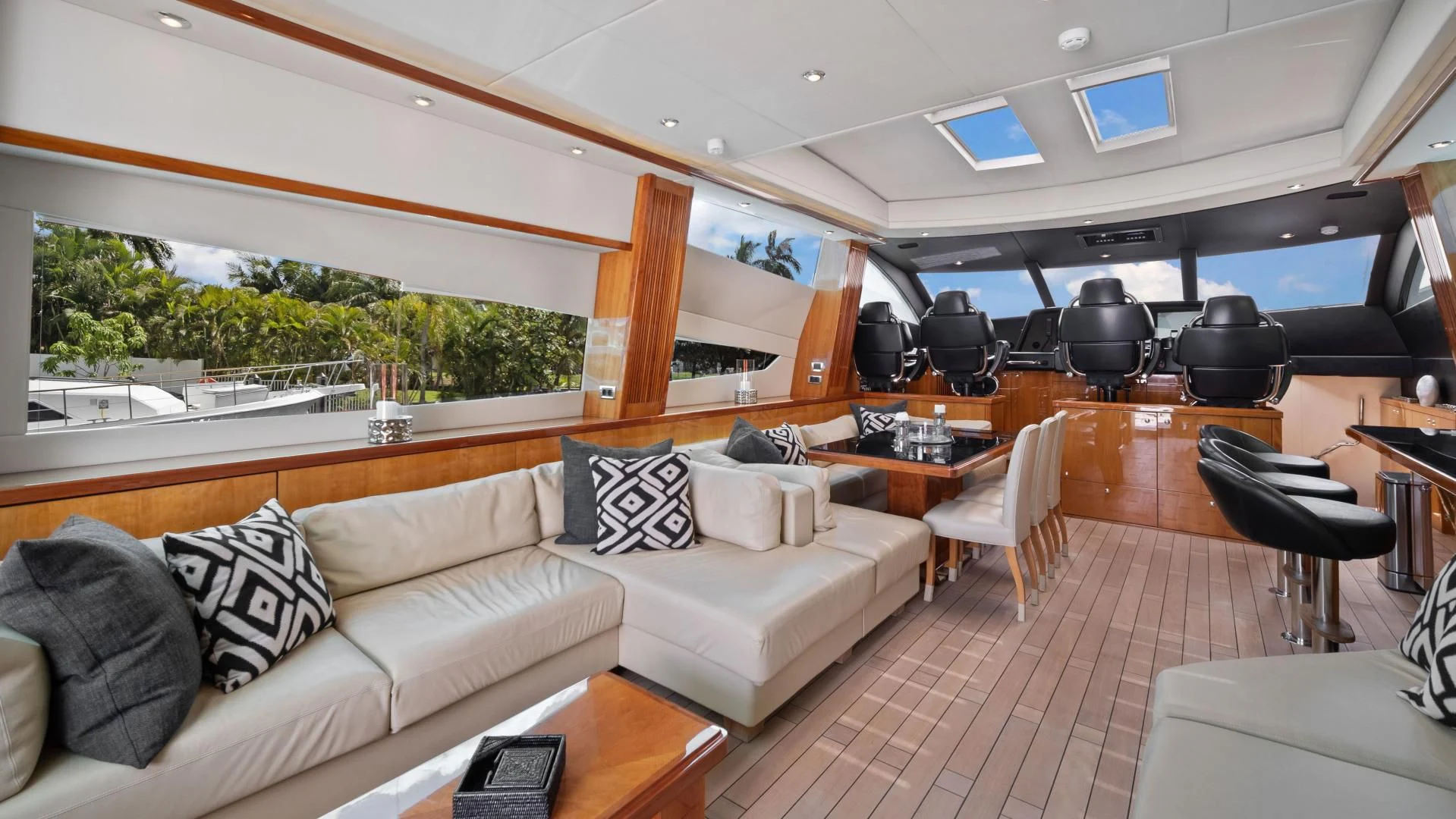 a living room with a couch and a table aboard DIABLO BLANCO Yacht for Sale