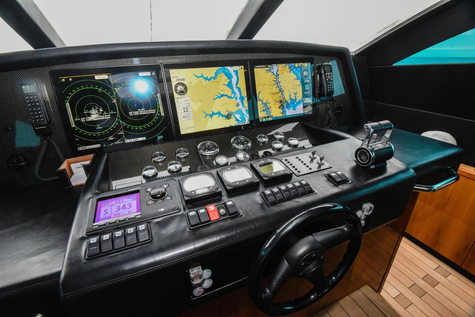 a black computer with a keyboard and mouse on a desk aboard DIABLO BLANCO Yacht for Sale