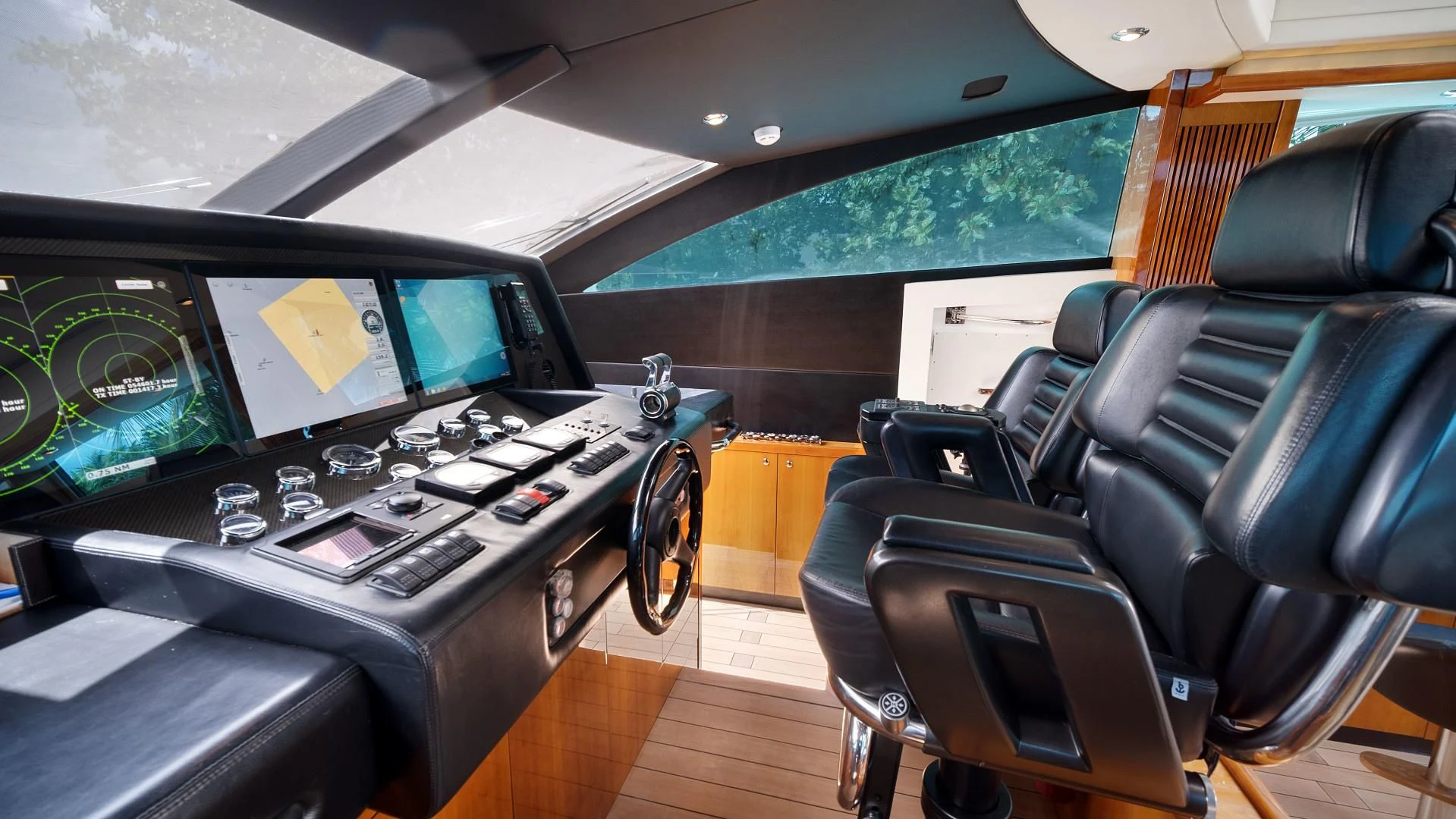 a room with a table and chairs aboard DIABLO BLANCO Yacht for Sale