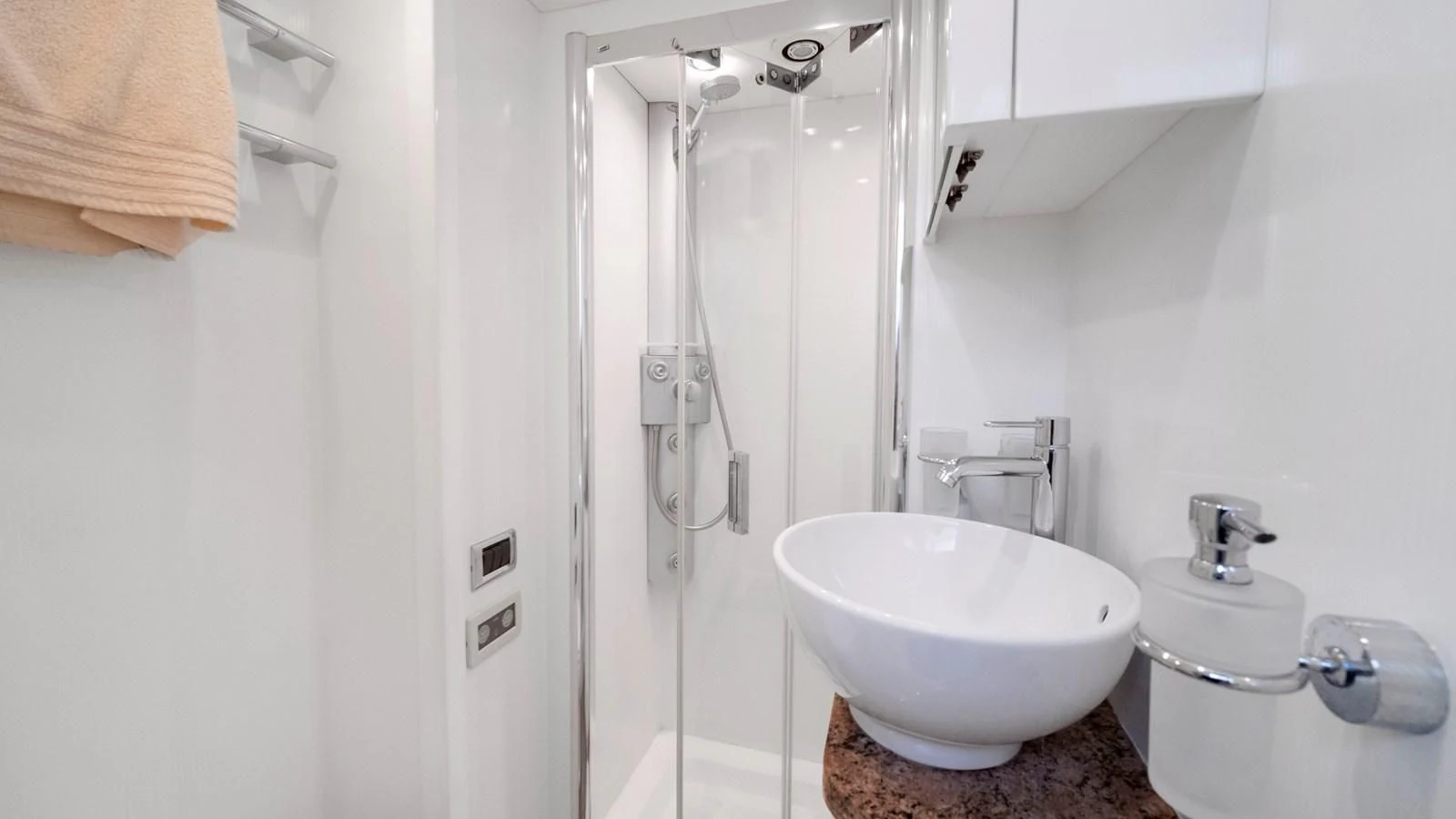 a bathroom with a shower and sink aboard DIABLO BLANCO Yacht for Sale