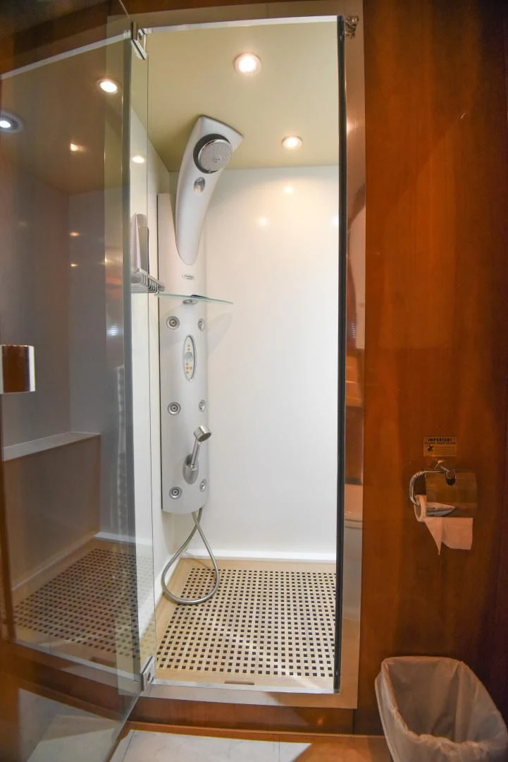a white urinal in a bathroom aboard DIABLO BLANCO Yacht for Sale