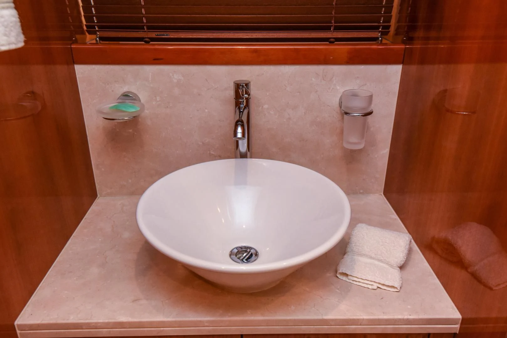 a sink with a soap dispenser aboard DIABLO BLANCO Yacht for Sale