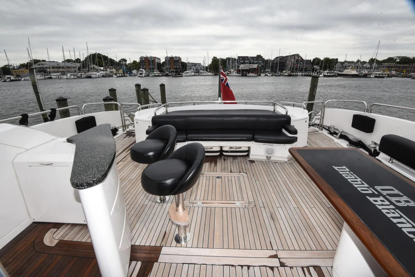 a deck with a view of a city and water aboard DIABLO BLANCO Yacht for Sale