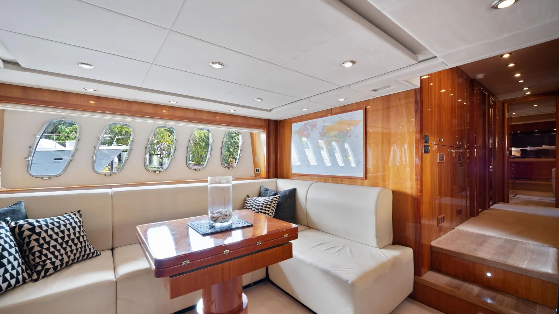 a living room with a couch and a table aboard DIABLO BLANCO Yacht for Sale