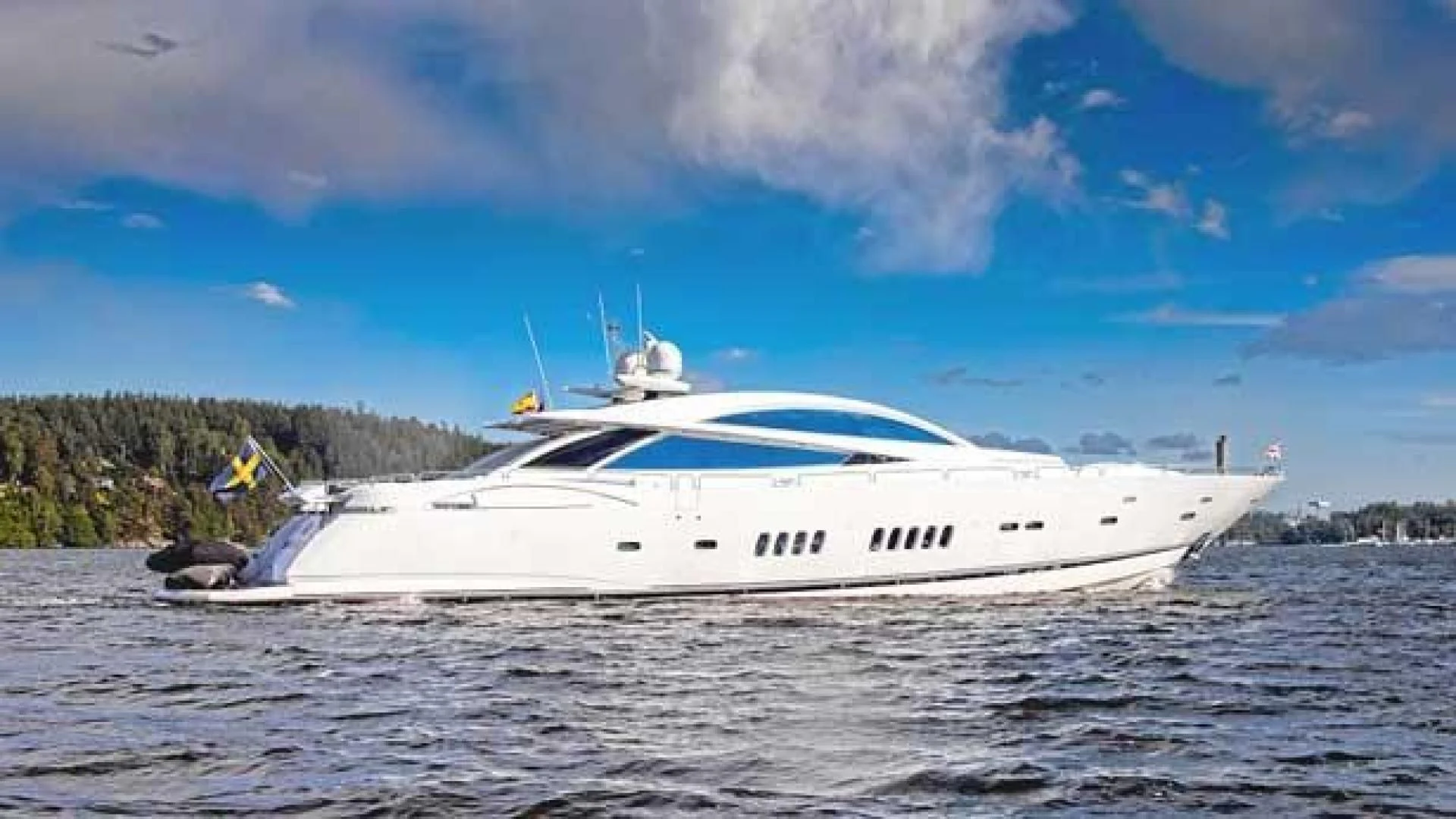 a white yacht on the water aboard DIABLO BLANCO Yacht for Sale