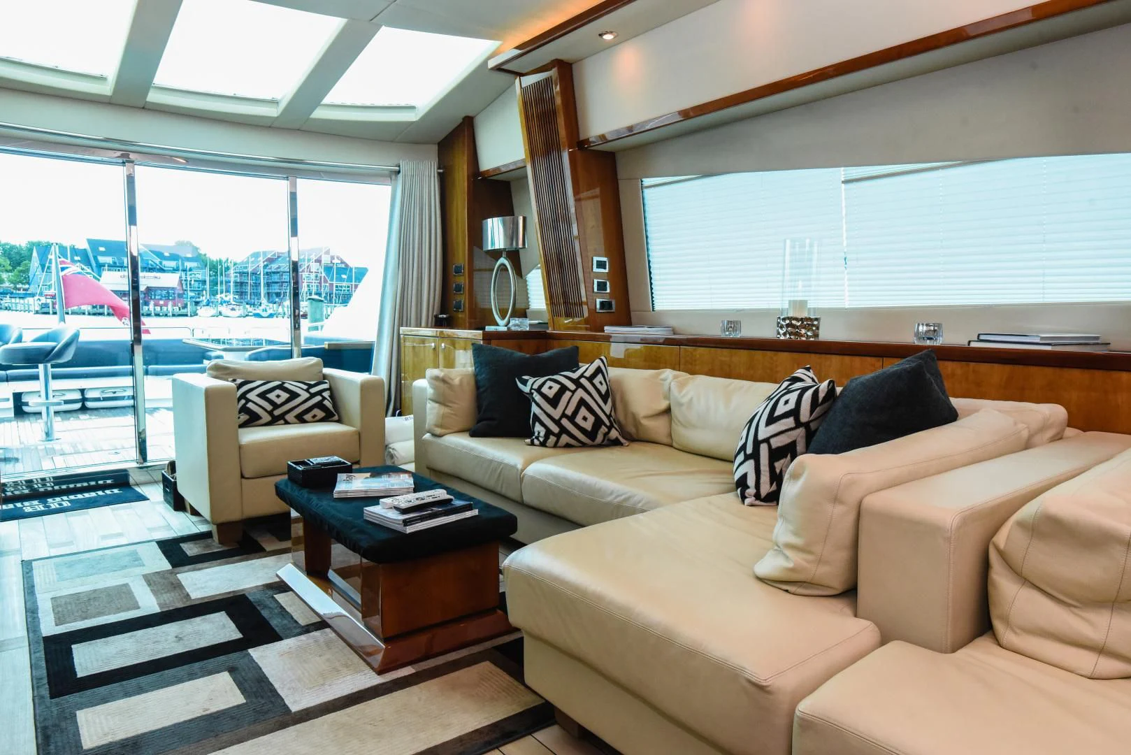 a living room with a large window aboard DIABLO BLANCO Yacht for Sale