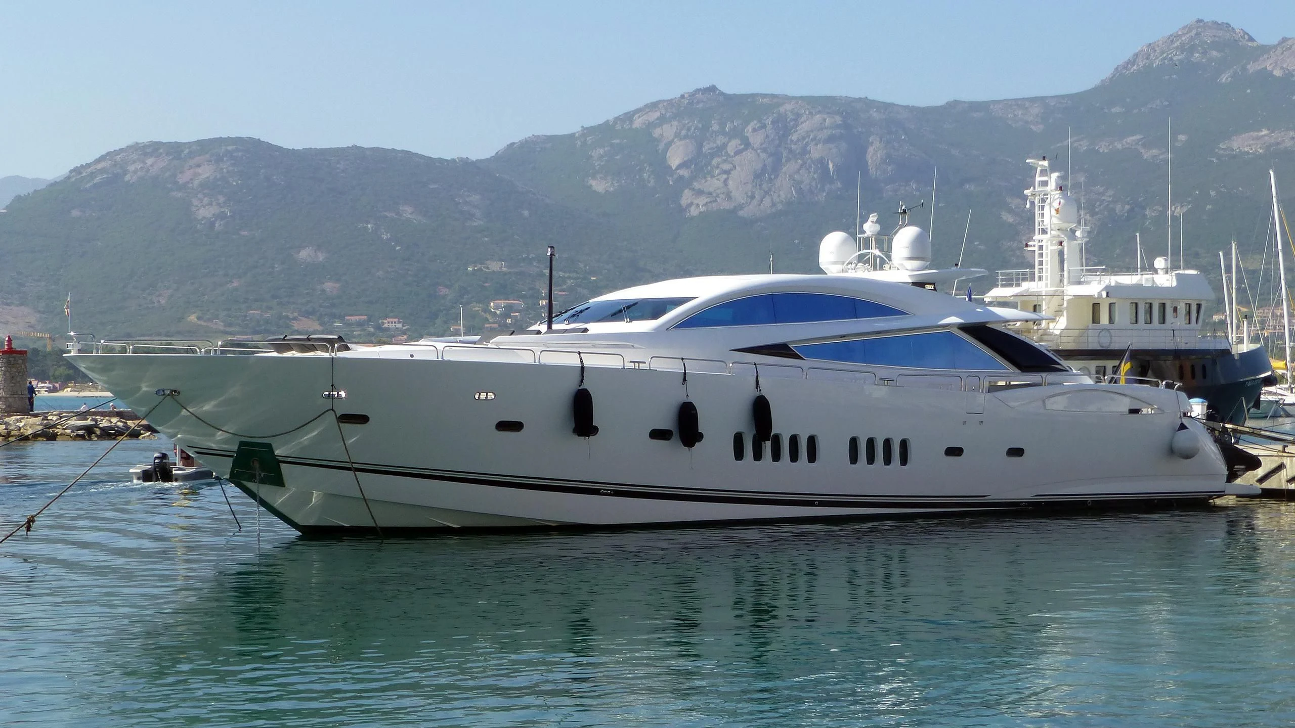 a white yacht in the water aboard DIABLO BLANCO Yacht for Sale