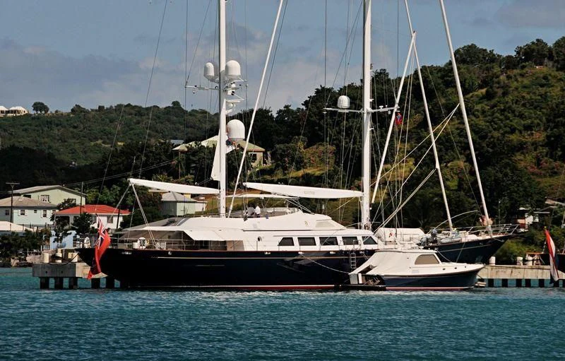 a boat docked at a pier aboard THE AQUARIUS Yacht for Sale