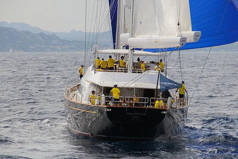 a group of people on a boat aboard THE AQUARIUS Yacht for Sale