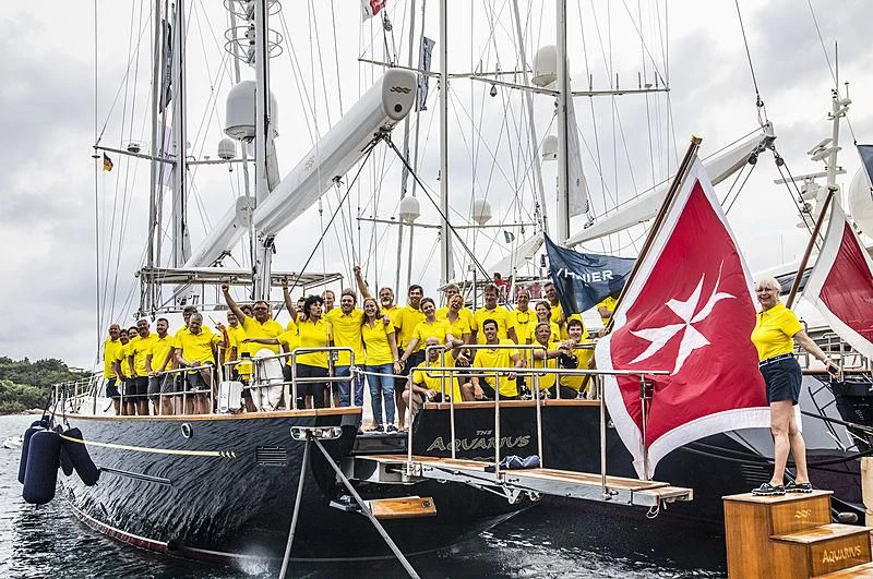 a group of people on a boat aboard THE AQUARIUS Yacht for Sale
