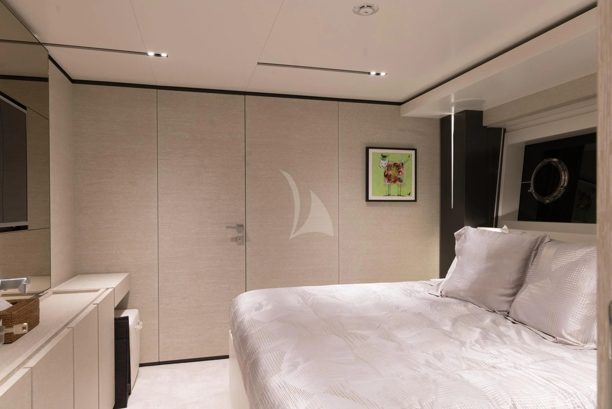 a bedroom with a bed and a large speaker aboard NEWAL Yacht for Sale