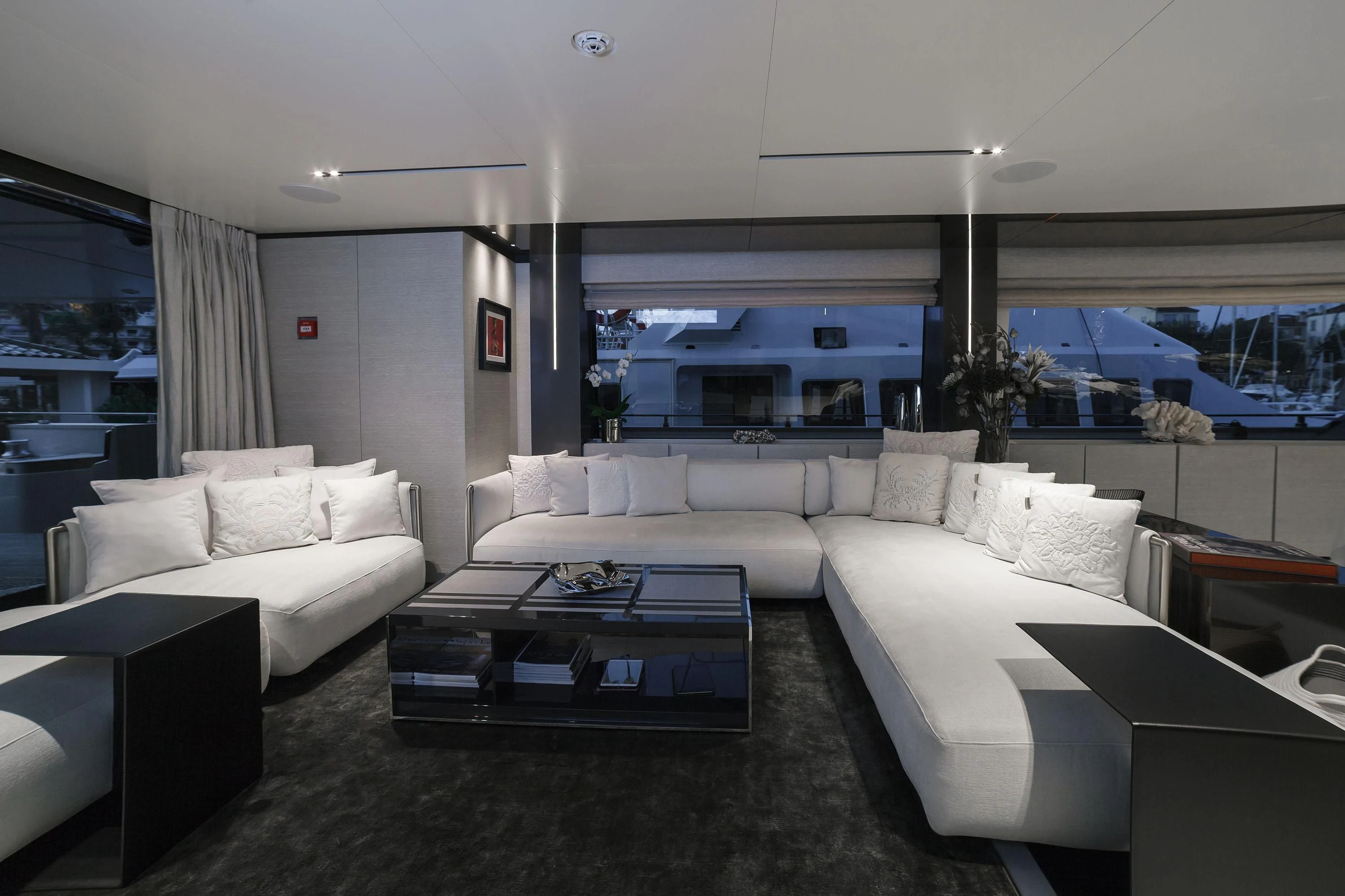 a living room with a large window aboard NEWAL Yacht for Sale