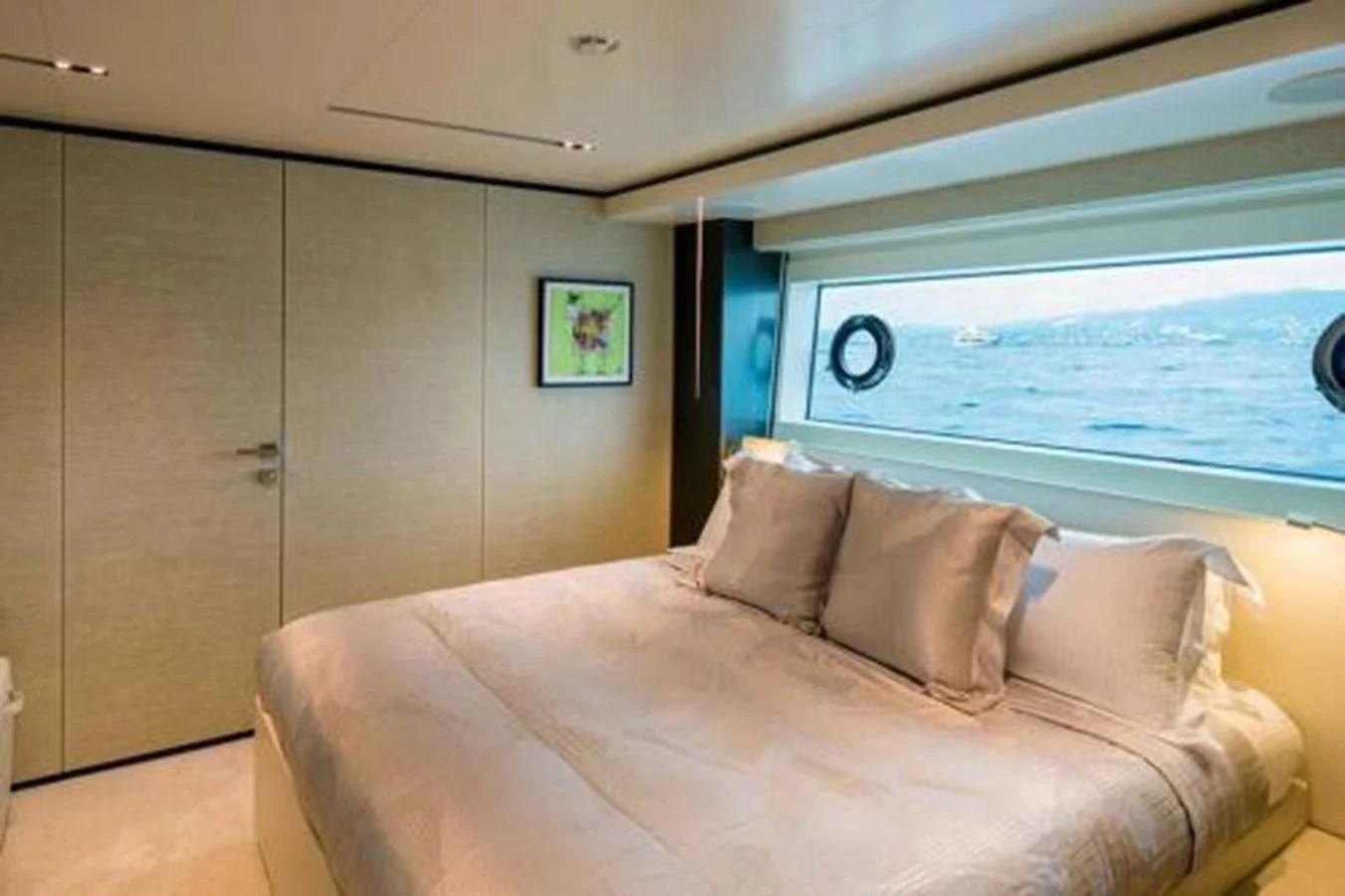 a bed in a room aboard NEWAL Yacht for Sale