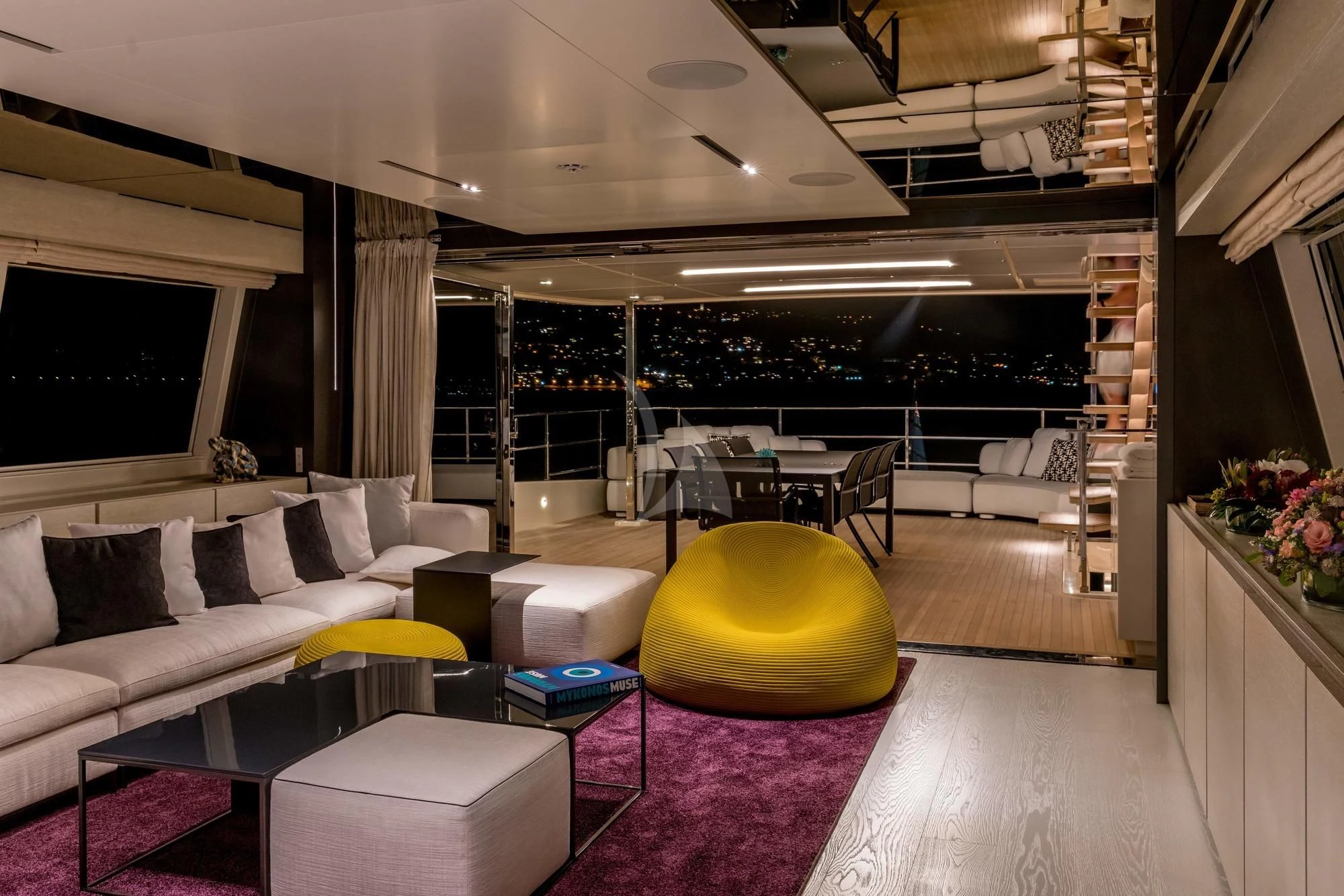 a living room with a large window aboard NEWAL Yacht for Sale