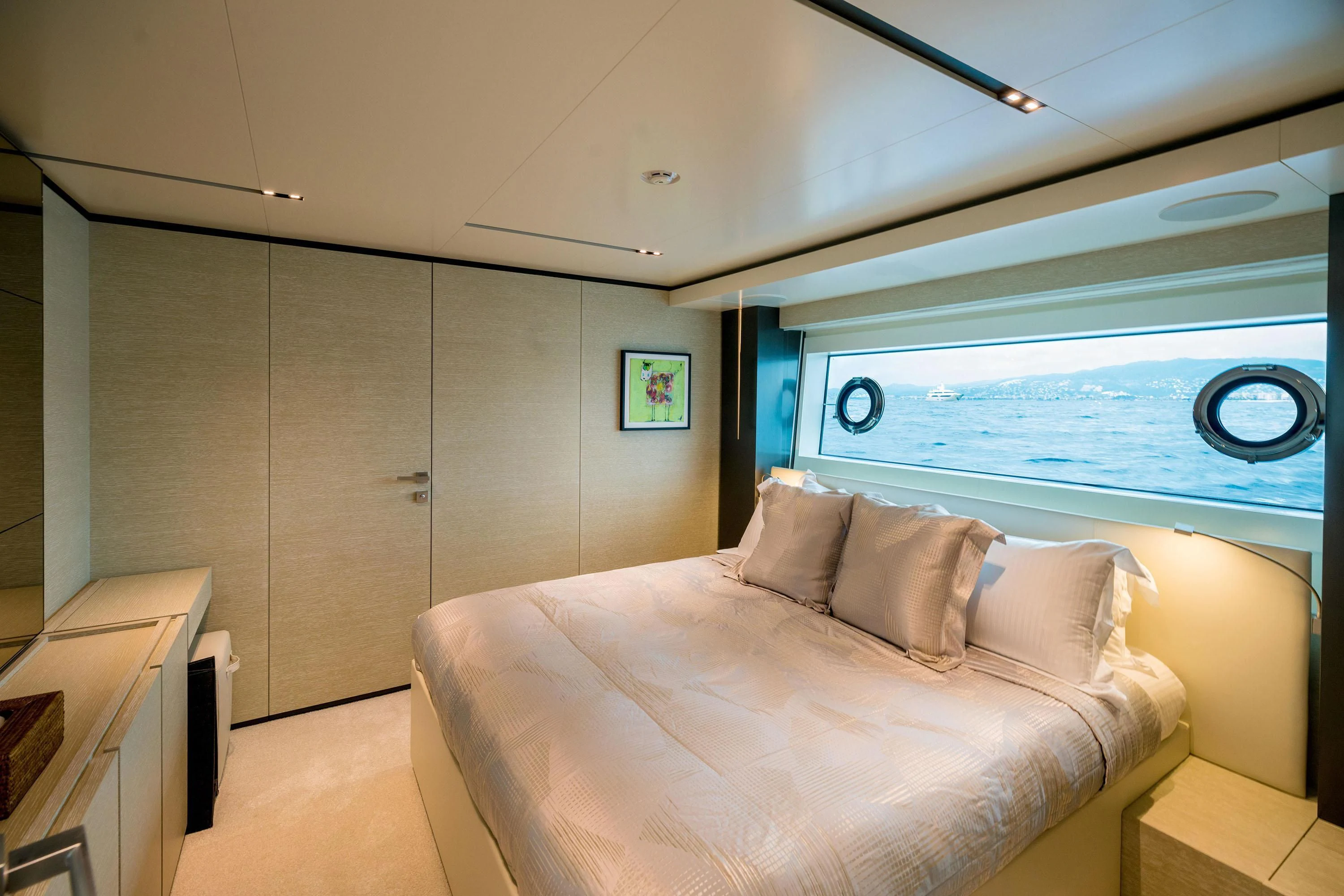 a bed in a room aboard NEWAL Yacht for Sale