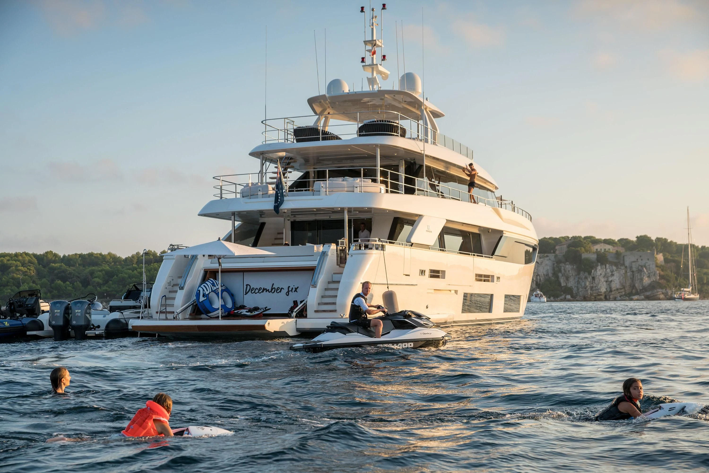 a large white boat with people in it aboard NEWAL Yacht for Sale