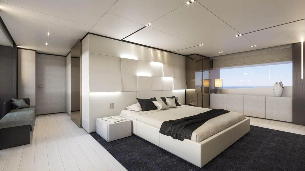 a large white bedroom with a large bed and a large window aboard NEWAL Yacht for Sale