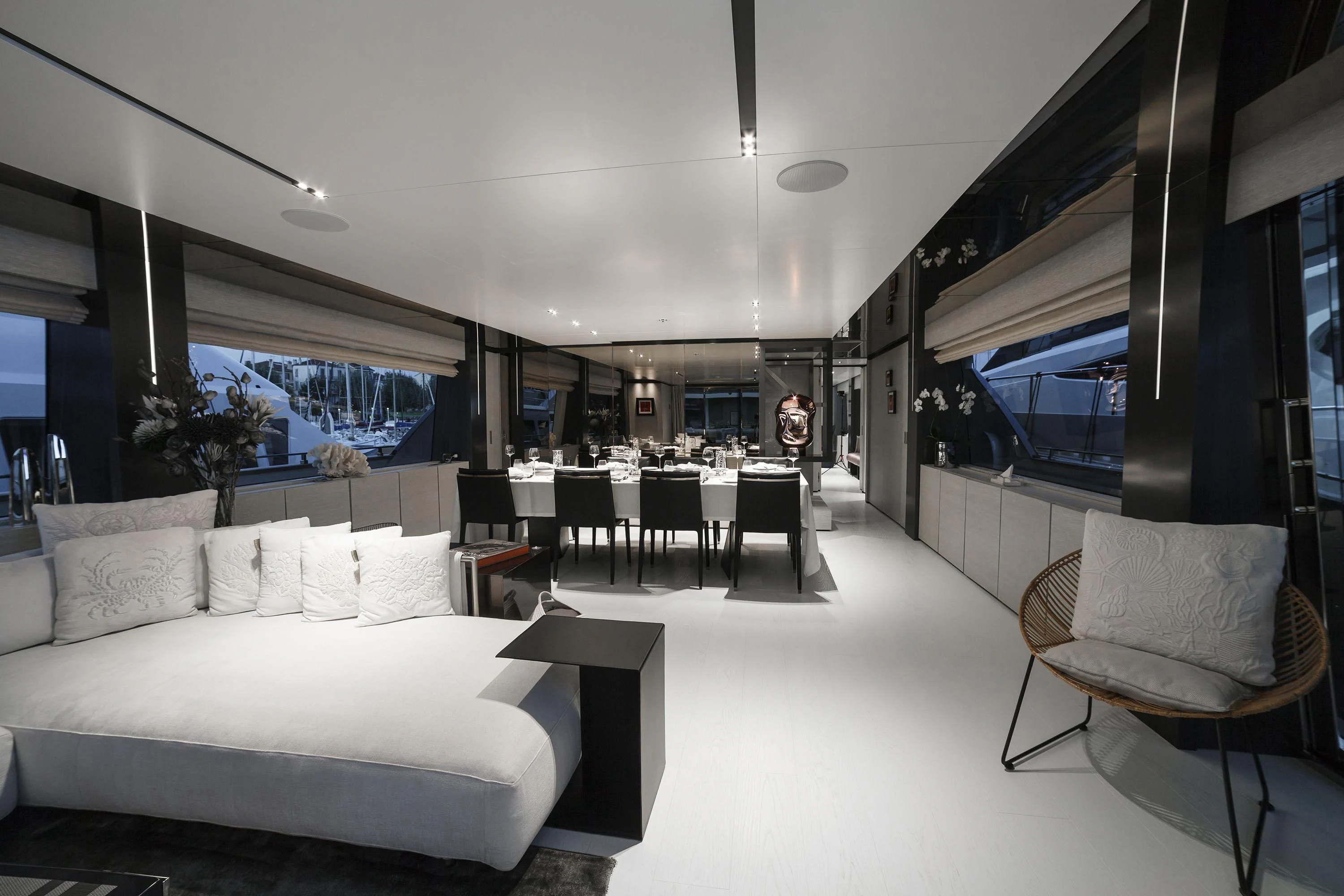 a room with a couch and a table and chairs aboard NEWAL Yacht for Sale