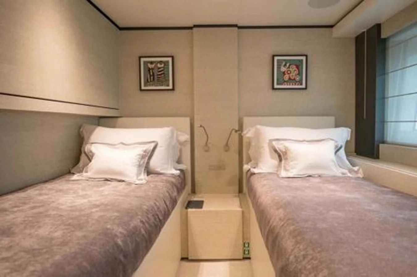 a couple of beds in a hotel room aboard NEWAL Yacht for Sale