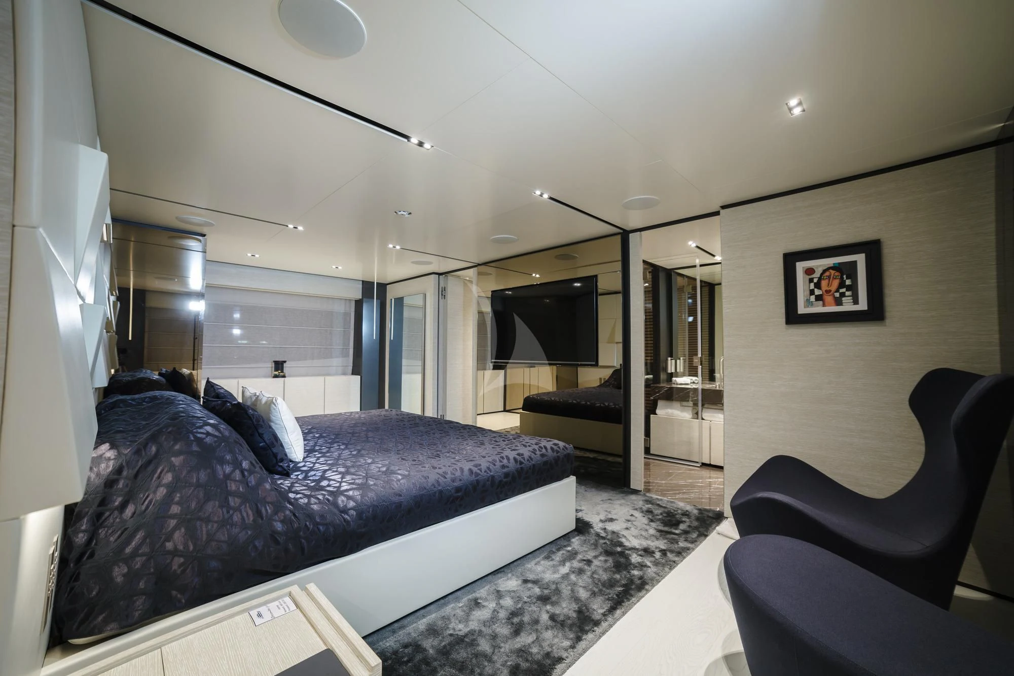 a living room with a couch and a chair aboard NEWAL Yacht for Sale