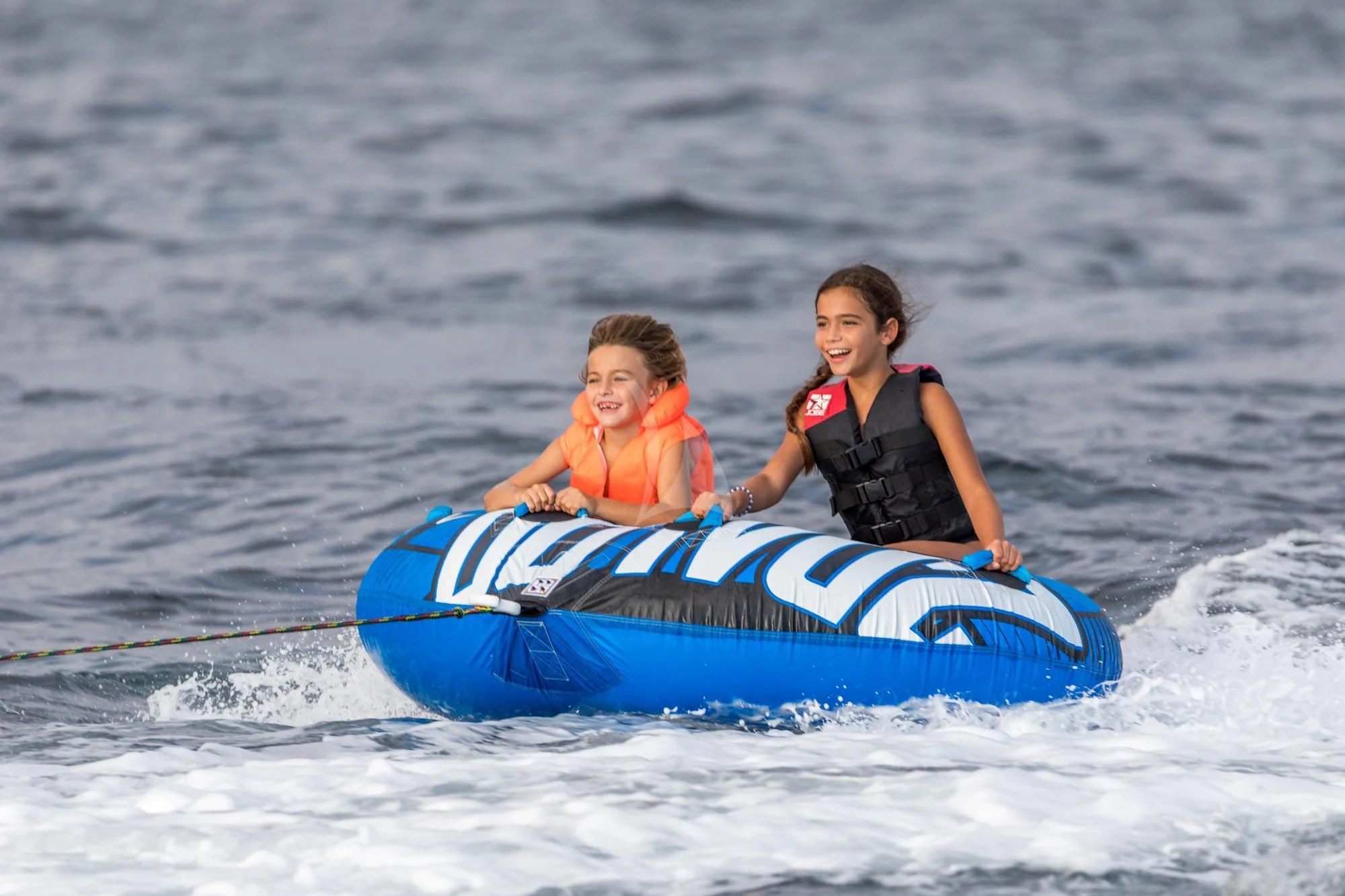 a couple of women on a jet ski in the water aboard NEWAL Yacht for Sale