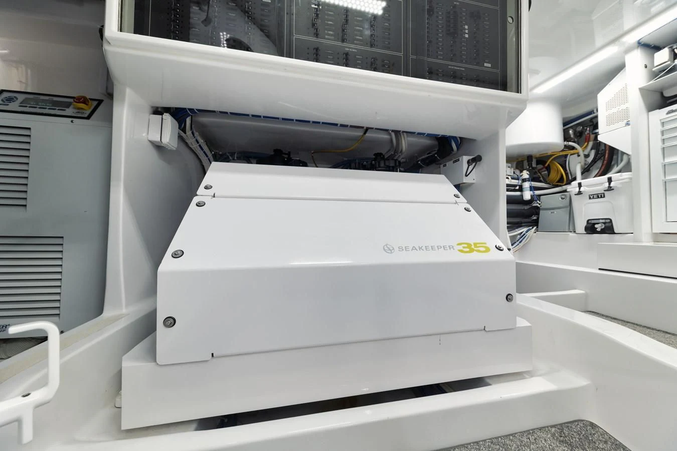 a machine with a large piece of paper on the top aboard JARUCO Yacht for Sale