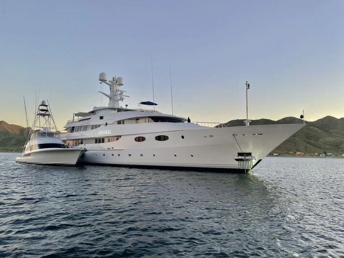 a couple of white boats on water aboard JARUCO Yacht for Sale